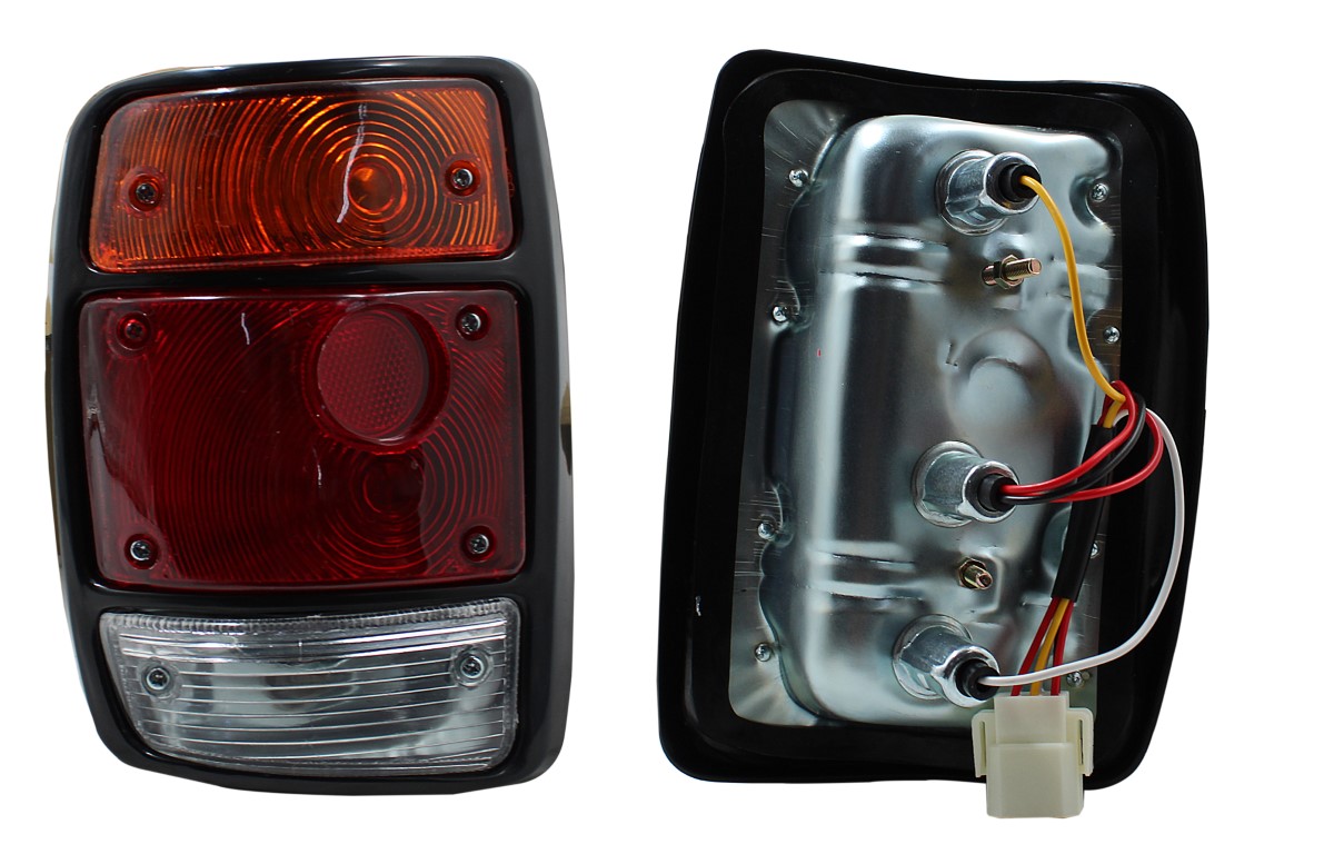 NISSAN 1400 71-07 LEFT HAND TAIL LAMP BALCK RIM